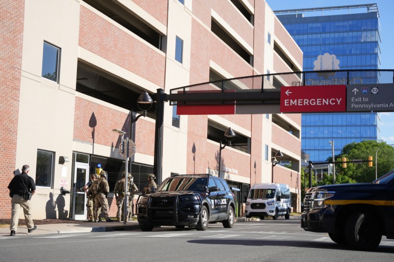 Law enforcement personnel stage outside of Wilmington Hospital after a shooting
