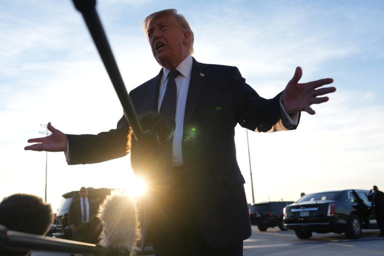 President Donald Trump talks to the media