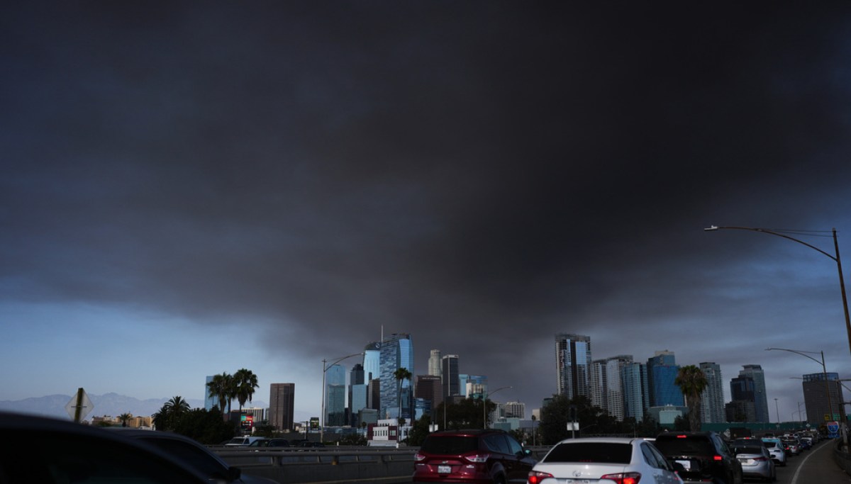 Los Angeles officials battle warehouse fire as smoke spreads across city