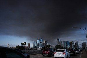 Los Angeles officials battle warehouse fire as smoke spreads across city