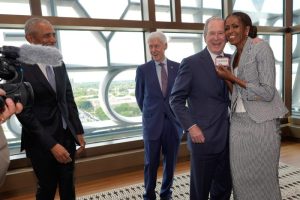Why George W Bush handed Altoids to Michelle Obama at her husband’s presidential center opening