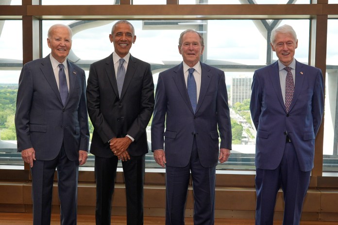Former presidents pose for a photo as the obama presidential center opening
