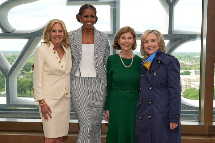 Former first ladies pose for a photo at the obama presidential center reopening
