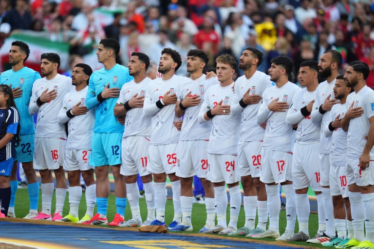 Iran's team stands for their national anthem during the World Cup