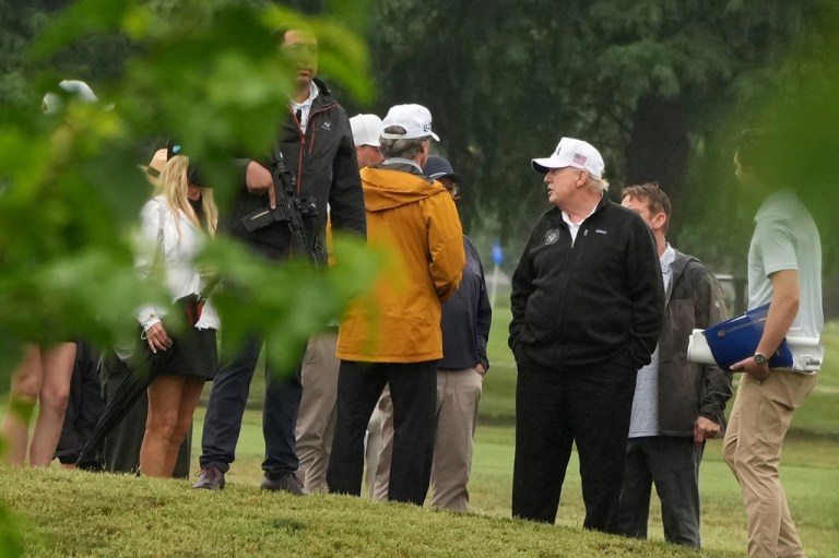 President Donald Trump, third right, tours the East Potomac Park golf course, Sunday, June 28, 2026, in Washington.