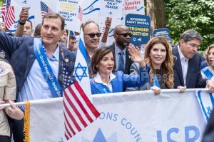 Protesters rally around coffee shop after dispute with Jewish congressman
