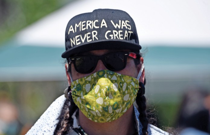 A protester in Keystone, South Dakota, July 3, 2020.  (Andrew Caballero-Reynolds/AFP/Getty)