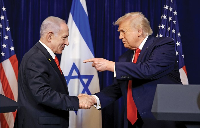 President Donald Trump shakes hands with Israeli Prime Minister Benjamin Netanyahu during a press conference in Palm Beach, Florida, Dec. 29, 2025. (Joe Raedle / Getty Images)
