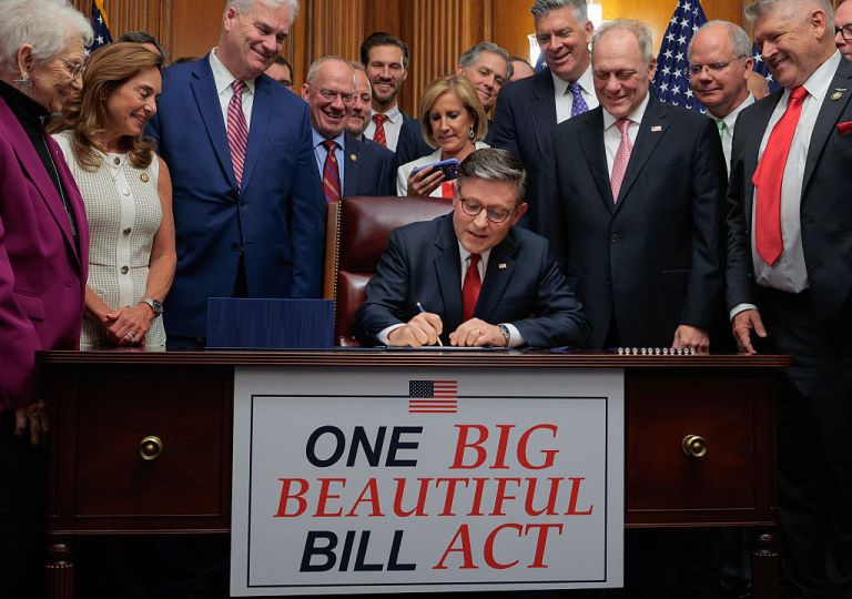 Speaker of the House Mike Johnson (R-LA) (C) signs the One Big Beautiful Bill Act during an enrollment ceremony with fellow Republicans in the Rayburn Room at the U.S. Capitol on July 03, 2025 in Washington, DC. The House passed the sweeping tax and spending bill after winning over fiscal hawks and moderate Republicans. The bill makes permanent President Donald Trump’s 2017 tax cuts, increase spending on defense and immigration enforcement and temporarily cut taxes on tips, while at the same time cutting funding for Medicaid, food assistance for the poor, clean energy and raises the nation’s debit limit by $5 trillion. (Photo by Chip Somodevilla/Getty Images)