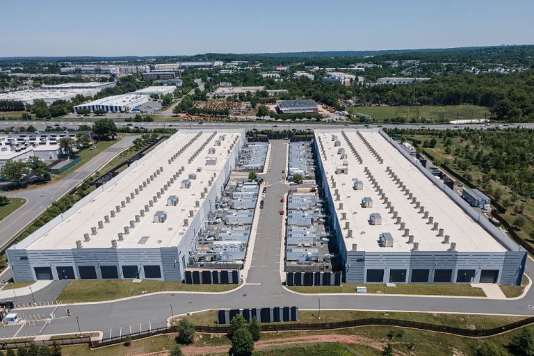 The Amazon Web Services IAD10 data center in Sterling, Virginia, US, on Sunday, May 31, 2026. NextEra Energy Inc. agreed to pay about $67 billion in stock for Dominion Energy Inc. in the biggest power acquisition ever, creating a giant utility extending from Florida to the artificial intelligence data centers clustered in Virginia. Photographer: Lexi Critchett/Bloomberg via Getty Images