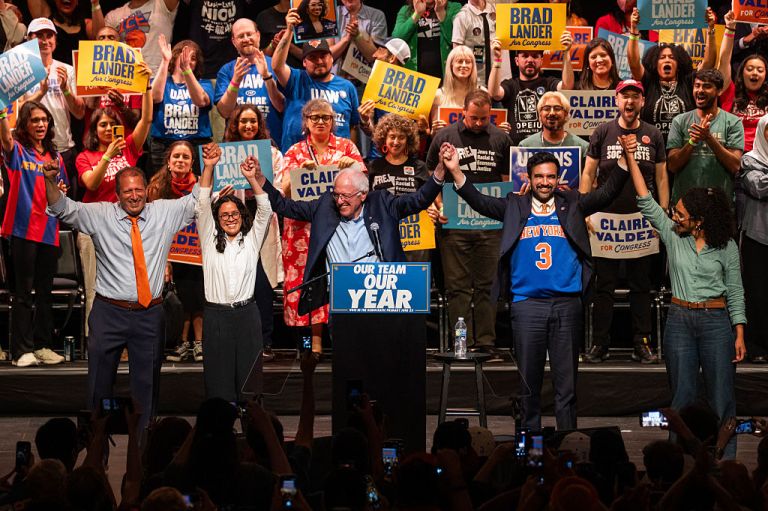 From left: Former New York City comptroller and Democratic House candidate Brad Lander, Democratic State Rep. Claire Valdez, Sen. Bernie Sanders (I-VT), New York Mayor Zohran Mamdani and Democratic House candidate Darializa Avila Chevalier hold hands during a 