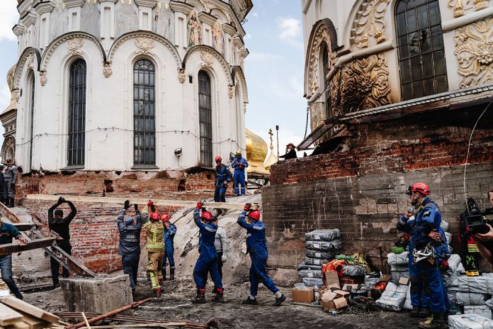 Workers repair damage caused by a Russian drone strike on the Dormition Cathedral of the Kyiv Pechersk Lavra on June 16, 2026 in Kyiv, Ukraine. Workers clear debris at the Dormition Cathedral of the Kyiv Pechersk Lavra, a UNESCO World Heritage Site, after it was damaged in a Russian drone strike on June 15. The attack destroyed the cathedral's roof, damaged one of its altars and destroyed exterior frescoes of Orthodox saints. A fire caused by the strike took nearly 24 hours to extinguish. (Photo by Iryna Vlasiuk/Babel.ua/Global Images Ukraine via Getty Images)