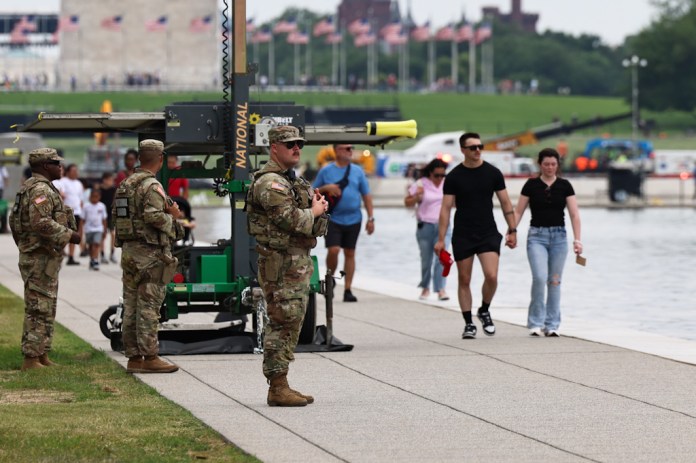 National Guard monitor the Lincoln Memorial Reflecting Pool. Photograph by Graeme Jennings/Washington Examiner 