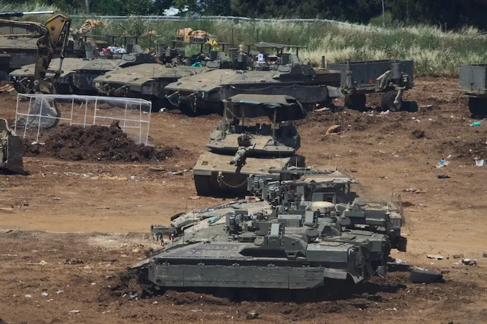 Israeli troops gather on the border with Lebanon.