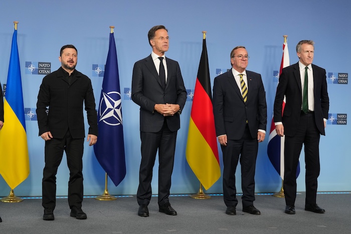 From left, Ukraine's President Volodymyr Zelenskyy, NATO Secretary General Mark Rutte, Germany's Defense Minister Boris Pistorius and Britain's Defense Secretary Dan Jarvis pose for a group photo prior to a meeting of the Ukraine Defense Contact Group at NATO headquarters in Brussels, Thursday, June 18, 2026. (AP Photo/Virginia Mayo)