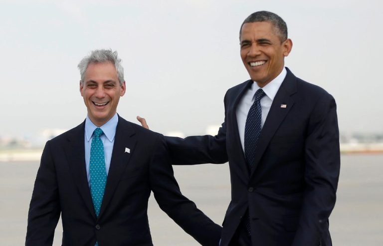 Then-Chicago Mayor Rahm Emanuel and then-President Barack Obama walk on the tarmac upon Obama’s arrival in Chicago on May 29, 2013. (Pablo Martinez Monsivais/AP)