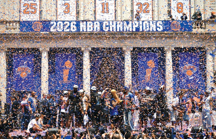 Members of the New York Knicks attend a championship celebration at City Hall Plaza after a ticker-tape parade on June 18, 2026. (ANGELA WEISS / AFP via Getty Images)