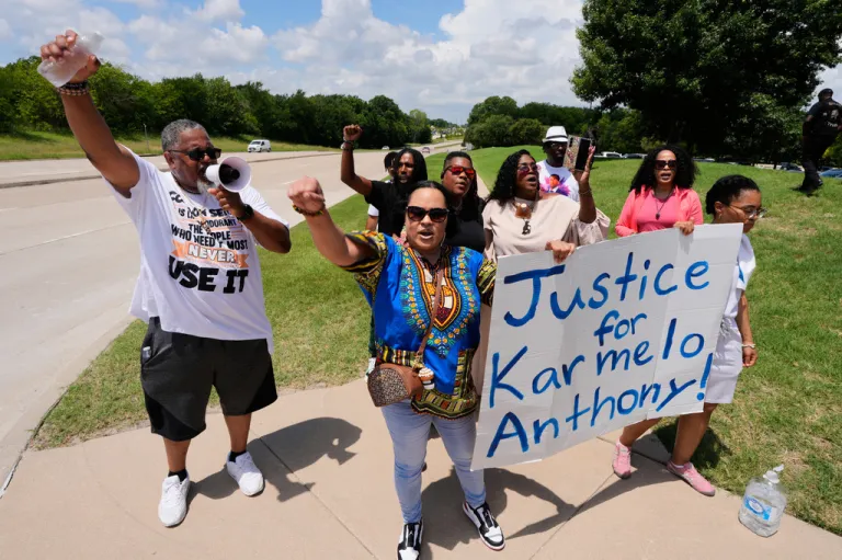 Supporters for Karmelo Anthony demonstrate in front of the Collin County courthouse.
