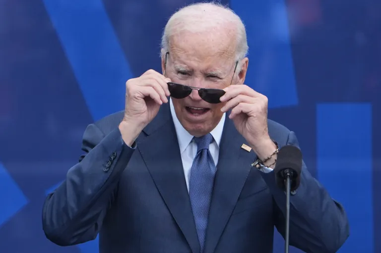 Former President Joe Biden looks out at the crowd during the dedication ceremony for the Obama Presidential Center.