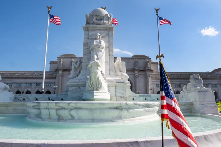 Government officials announce the finished renovation of Columbus fountain in front of Union Station. (US Department of Transportation)