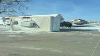 A flipped trailer allegedly used by DAMN during a “hard” blockade. (U.S. Justice Department)