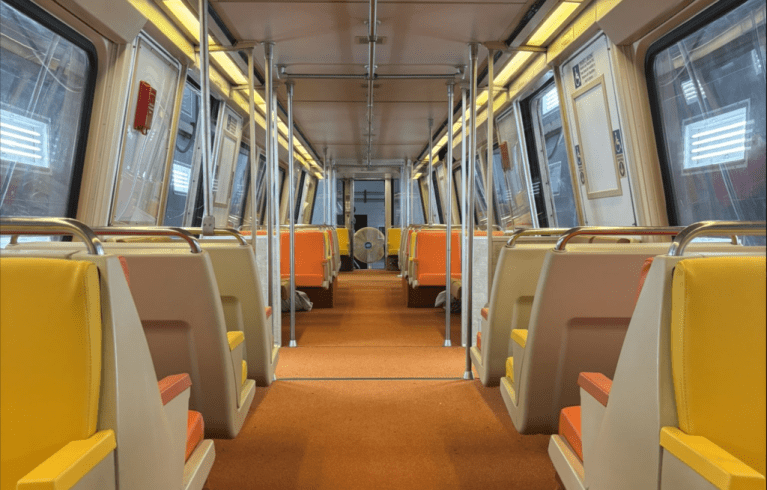 Photo of a 1000 series Metro rail car, restored to its 1976-era glory. (Courtesy: X/@wmata).