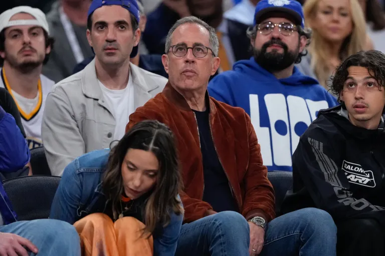 Jerry Seinfeld watches during the second half of Game 4 of the NBA Finals basketball series between the San Antonio Spurs and the San Antonio Spurs.