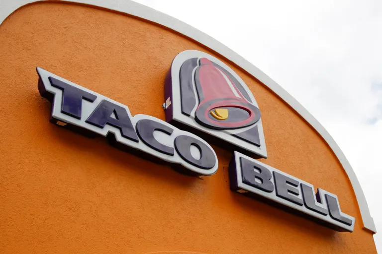 A sign hangs at a Taco Bell.