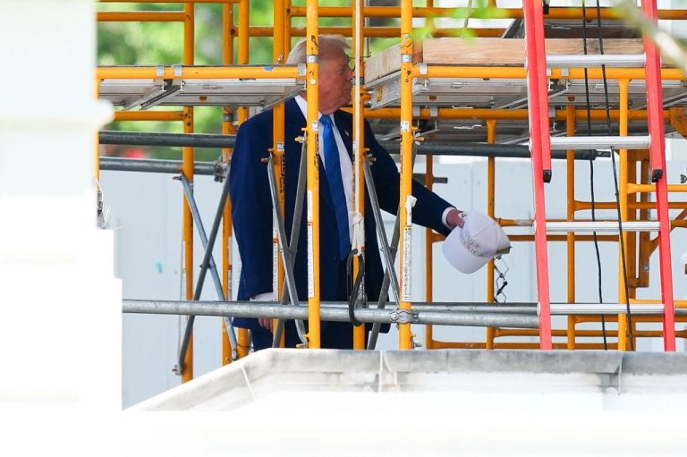 Trump in the scaffolding.