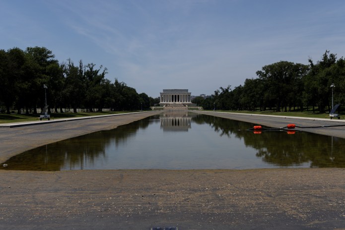 The Reflecting Pool as seen on Monday, July 13, 2026. Interior Secretary Doug Burgum announced that crews would drain the pool for a second time for repairs and cleanup following months of maintenance issues.