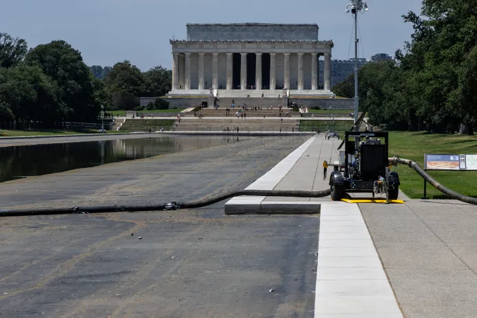 The Reflecting Pool as seen on Monday, July 13, 2026. Interior Secretary Doug Burgum announced that crews would drain the pool for a second time for repairs and cleanup following months of maintenance issues.