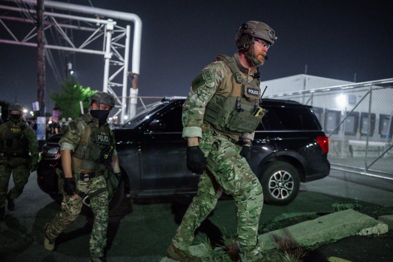 A Special Response Team (SRT) with Immigration And Customs Enforcement (ICE) arrives at the Delaney Hall Detention Facility during a protest over federal immigration enforcement raids on Thursday, June 12, 2025, in Newark, N.J. (AP Photo/Olga Fedorova)