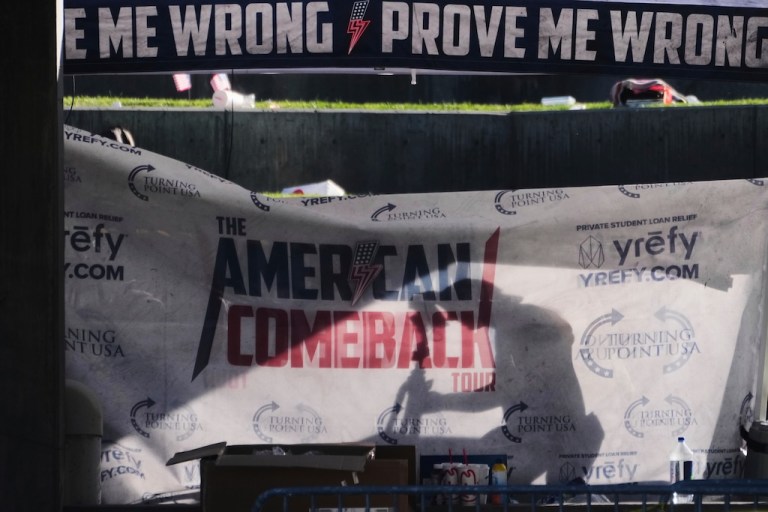 An FBI field photographer documents the scene at Utah Valley University the day after Charlie Kirk was shot and killed Thursday, Sept. 11, 2025, in Orem, Utah. (AP Photo/Lindsey Wasson)