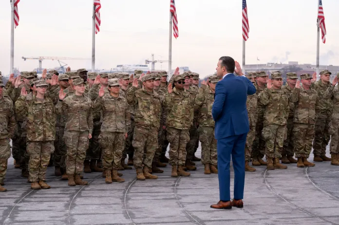 War Secretary Pete Hegseth speaking to a group of National Guard soldiers
