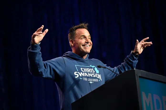 Genessee County, Mich. Sheriff Chris Swanson, a gubernatorial candidate, addresses delegates during the Michigan Democratic Party State Endorsement Convention, Sunday, April 19, 2026, in Detroit.