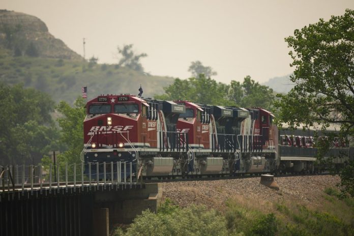 The Freedom 250 train, with President Donald Trump aboard, arrives at the grand opening of the Theodore Roosevelt Presidential Library