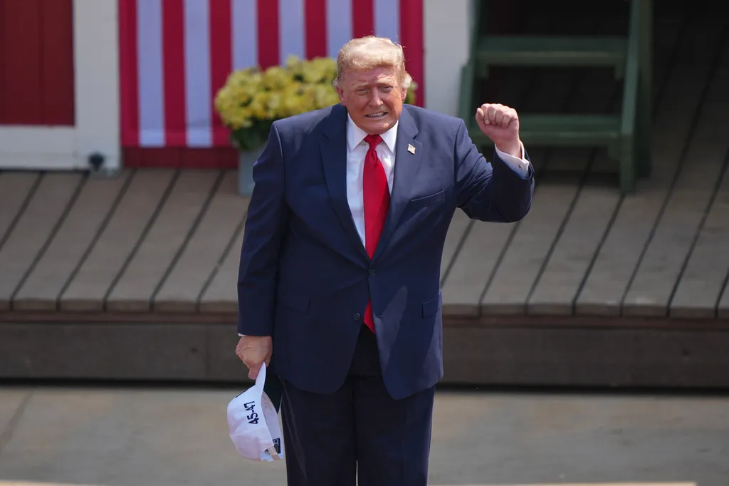 Trump signs pardons for 11 people, most convicted of vehicle emissions violations