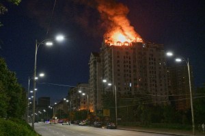 Russian missile attack on Kyiv collapses apartment building, trapping residents
