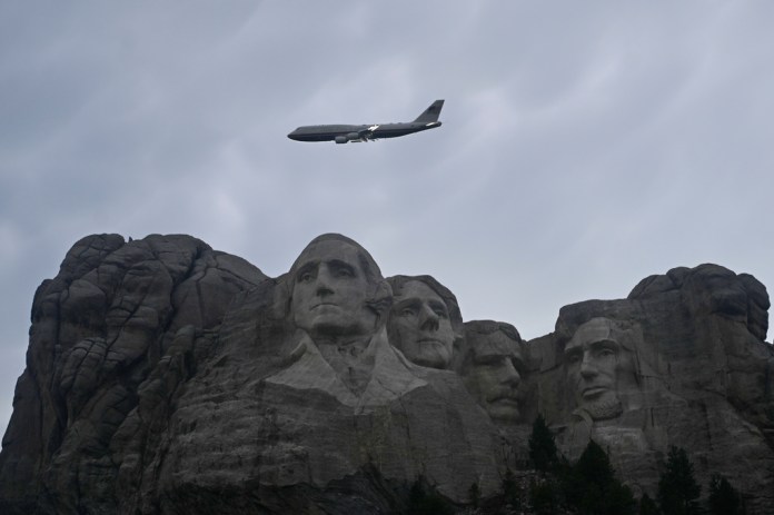 Air Force One performs a flyover at Mount Rushmore National Memorial, Friday, July 3, 2026, in Keystone, S.D.