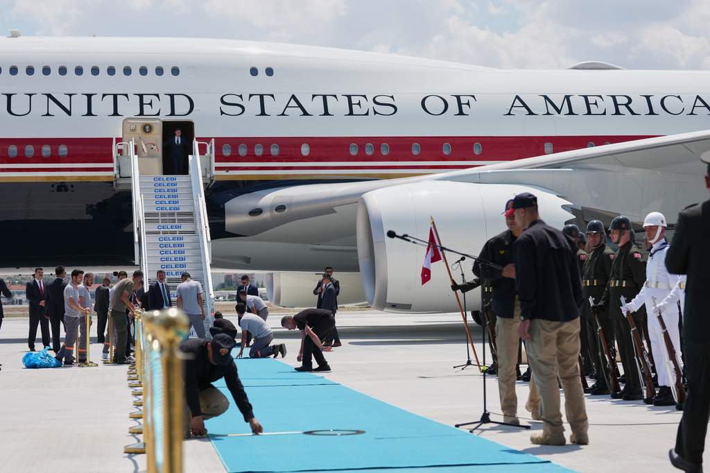 Trump arrives at NATO summit with renewed confidence he can end the war in Ukraine