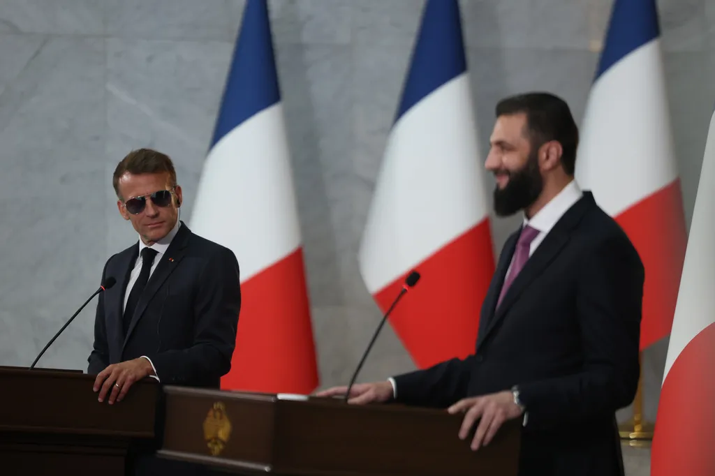 Macron addresses ‘elements of risk’ in Syria’s reintegration after bomb goes off outside his hotel