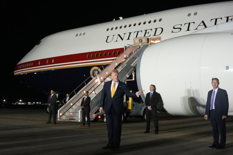 President Donald Trump speaks while switching planes at U.S. Air Force Base, RAF Mildenhall in Suffolk Eastern England, on his way back to Washington from the NATO summit in Ankara, Turkey, Wednesday, July 8, 2026.