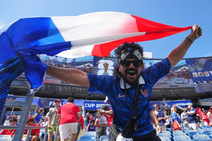 A France fan is seen prior to the World Cup quarterfinal soccer match between France and Morocco in Foxborough, Mass., near Boston, Thursday, July 9, 2026. (AP Photo/Martin Meissner)