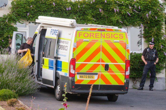 Police outside the house of former lawmaker Ann Widdecombe, in Haytor, England, Friday July 10, 2026, after she was found dead in her home on Thursday with serious injuries.