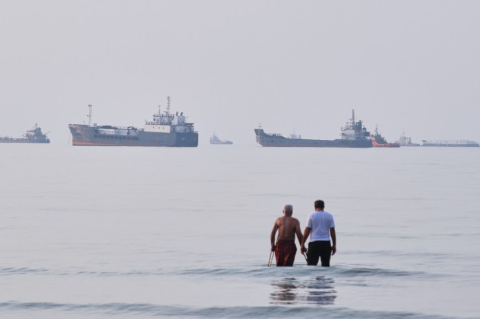 One dead after Iran attacks two tankers in Strait of Hormuz, UAE says