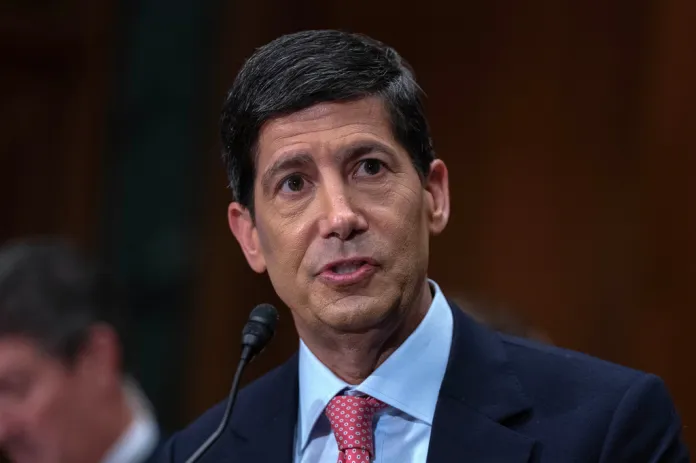 Fed holds rates steady, with three officials dissenting