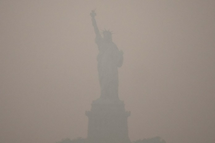 APTOPIX New York Climate Wildfires Smoke