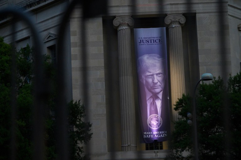 Image of President Donald Trump on the Justice Department building