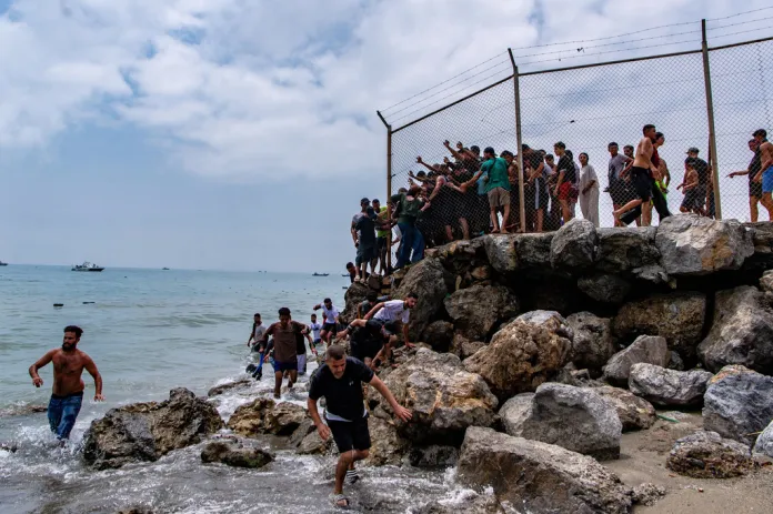 Migrants entering Ceuta Spain