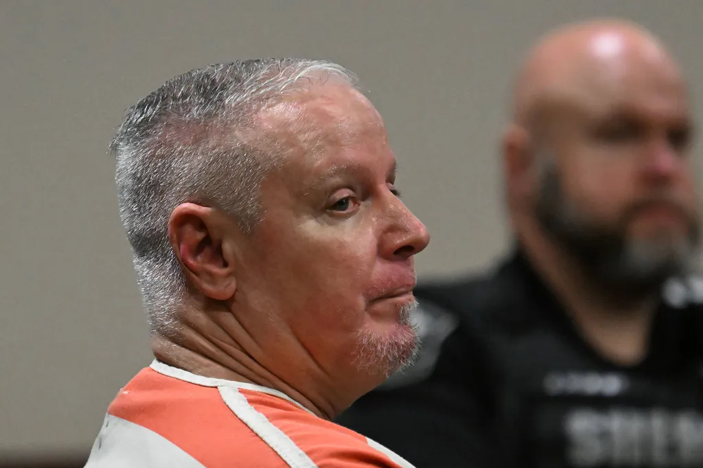 Father of Georgia mass shooter sentenced to 15 years in prison